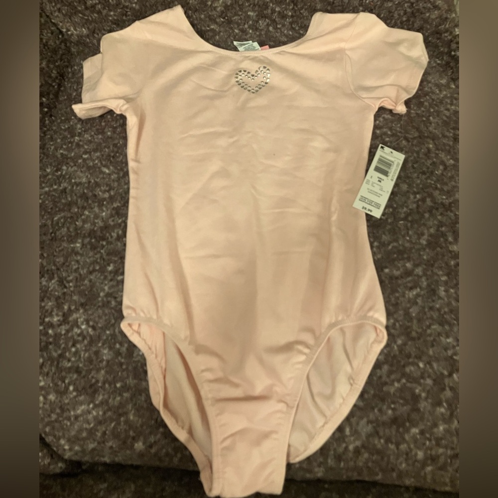 Pink leotard new with tags.
